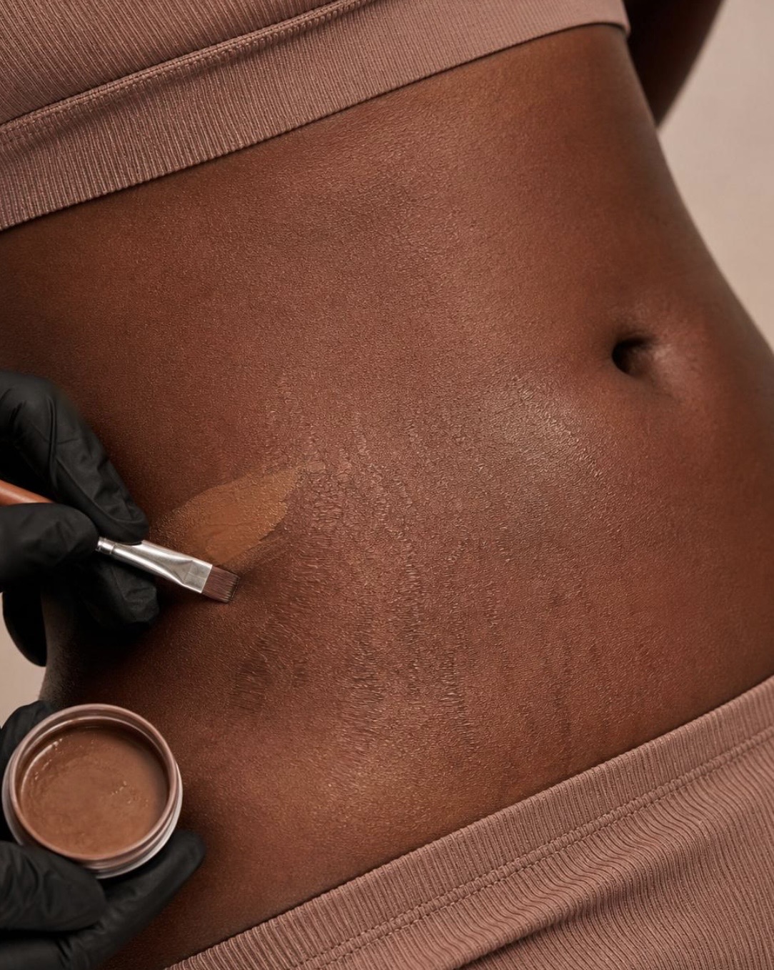 Stretch Mark Camouflage — representing the full spectrum of melanin skin tones at Aura by Laura NYC